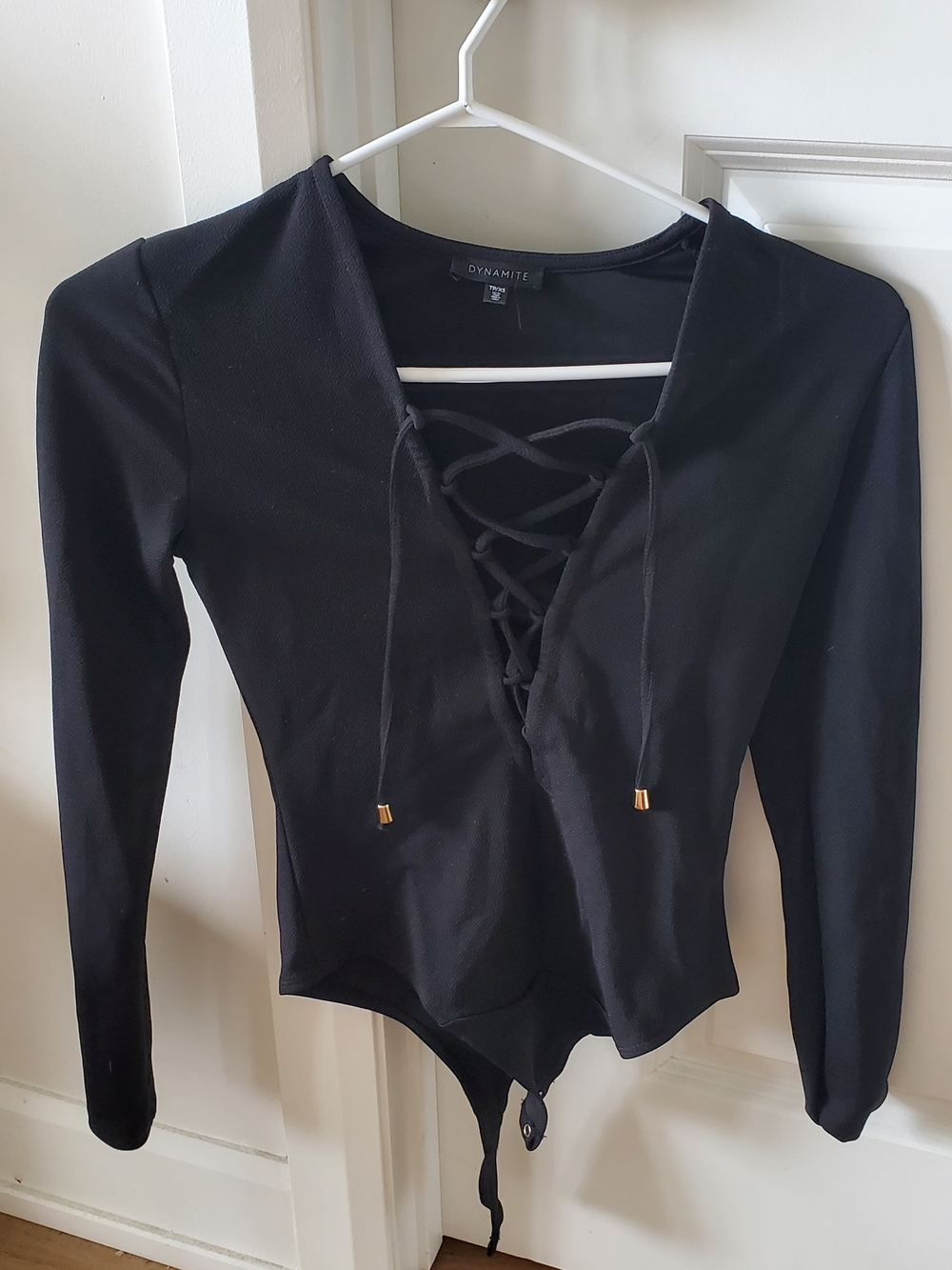 Dynamite Black Lace-Up Long Sleeve Bodysuit with Gold Trim